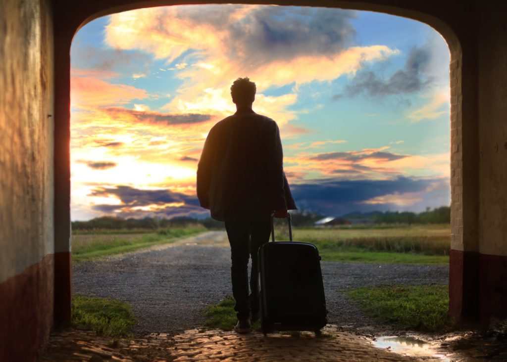 person sunset travel insurance
